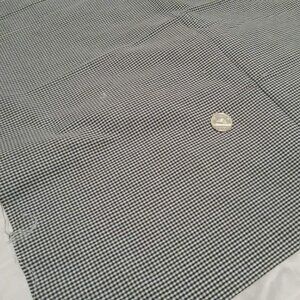 Two large pieces of black and white checkered fabric (end of roll)